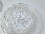 a glass object that is sitting on top of a table