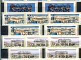 a group of stamps of different countries on display in a black frame