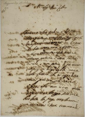 lettre manuscrite écrite à l'encre noire sur une feuille de papier