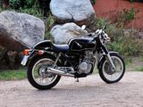 a motorcycle that is parked on the side of the road