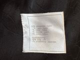 the label on a black jacket