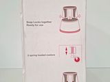 packaging of a blender sitting on a table with instructions on how to use it