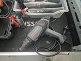 a box with tools in it that is sitting on the floor