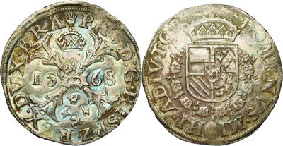 une pièce d'argent sur laquelle figurent des armoiries