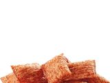 a pile of food that is sitting on a white surface