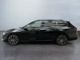 the black honda odyssey is parked in a parking lot