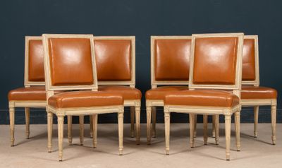 set of four chairs with leather upholstered backrests