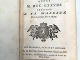 un livre ouvert dont la couverture représente un aigle