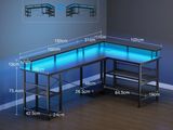 an image of a computer desk with a glass top and shelves