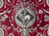 an image of a red and white wallpaper with a picture of a cat