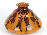 a vase that has a design on the inside of it