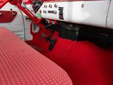 a close up of a red and white car dashboard
