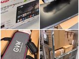 several pictures of a display of electronics and boxes in a store