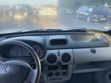 a dashboard of a car with a view of a street
