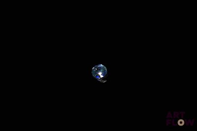 an image of a diamond in the dark with a black background