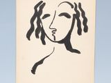 l'image d'un dessin du visage d'une femme sur un morceau de papier