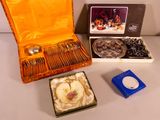 a box of silverware and a box of silverware on a table