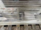 a stack of pallets sitting on top of a wooden pallet