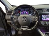 a picture of the interior of a car with a steering wheel