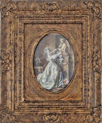 une image représentant un tableau où figurent une femme et un enfant, dans un cadre doré