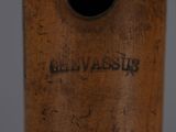 a close up of a baseball bat with a baseball cap on it