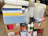 a cart full of supplies and supplies in a warehouse