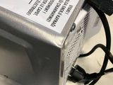an image of a computer power supply sitting on top of a desk