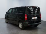a picture of a black van parked in a room