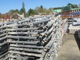 a large pile of pipes stacked on top of each other