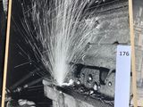 black and white photograph of a fire hydrant spewing water out of it