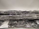 a lot of plastic wrapped up items on a table