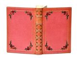 un vieux livre orné d'un motif de rose est ouvert sur un fond blanc