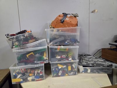 a lot of legos sitting on a table in a room