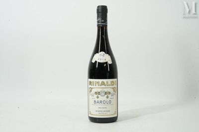 a bottle of wine that is sitting on a table