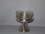 a silver plate that is sitting on a table