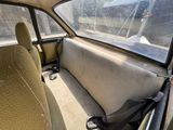 a car that has a seat in the back of it