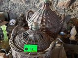 a wicker basket that has a green tag on it