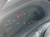 dashboard of a car with a speedometer and gauges in the dash