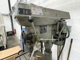 a machine that is sitting in a room with tools