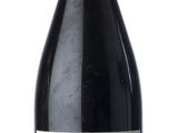 a bottle of wine that is sitting on a table