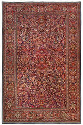 tapis persan ancien à motif floral sur fond rouge