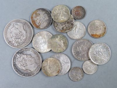 a lot of coins that are sitting on a table