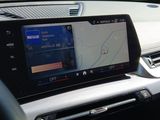 the dashboard of a car with a gps device on it