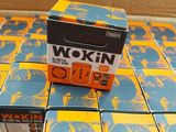 several boxes of wax on a table with a box of wax in the background