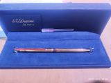a pen that is sitting inside of a blue box