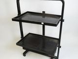 an image of a black metal shelf with two shelves on it