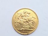 a gold coin with a picture of a man on a horse on it