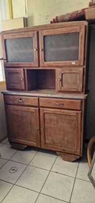an old wooden cabinet in the corner of a room