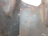 a close up of a piece of metal that has been rusted