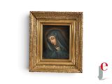 une image représentant un tableau d'une femme vêtue d'une robe bleue